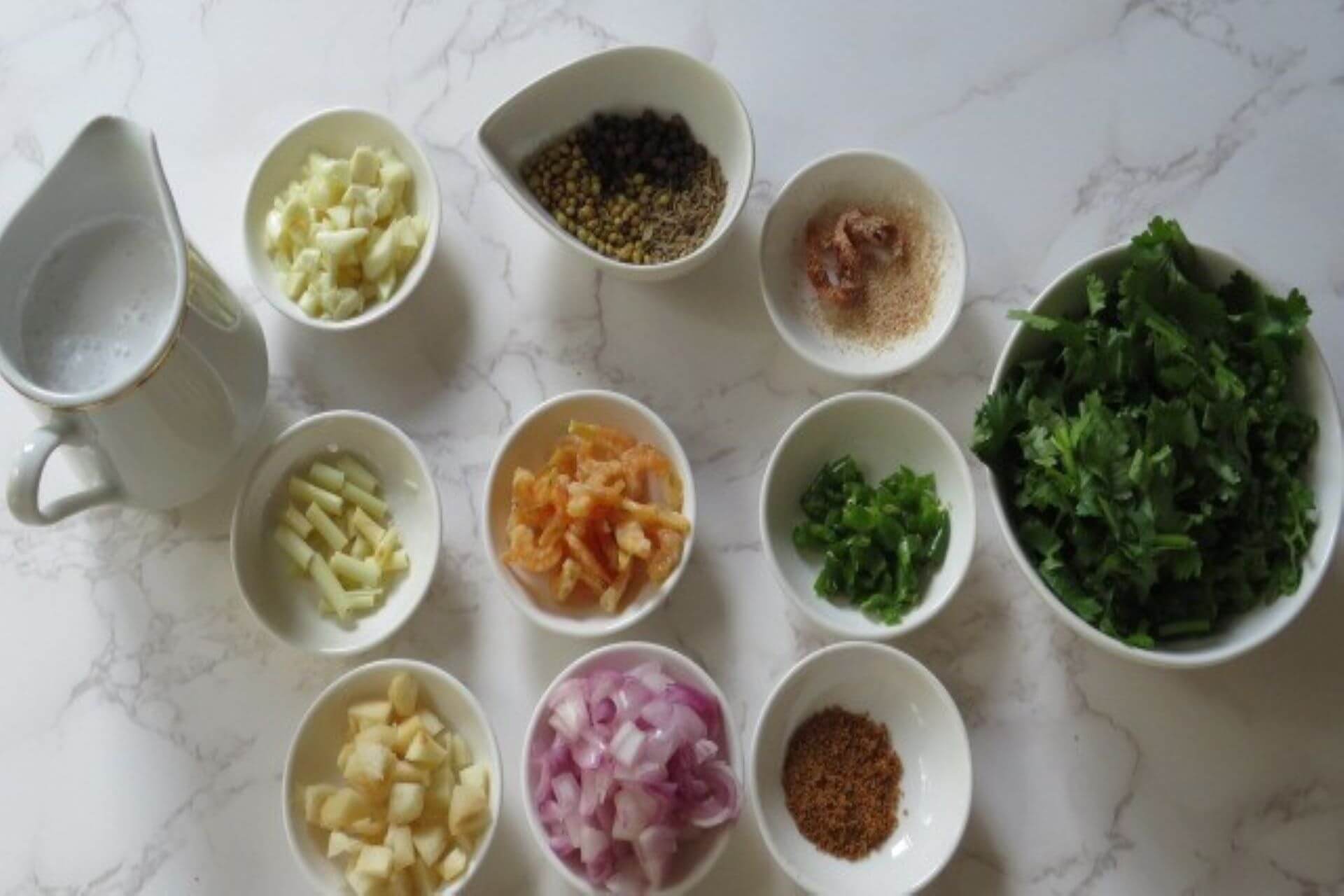 ingredients in small bowls for the curry paste