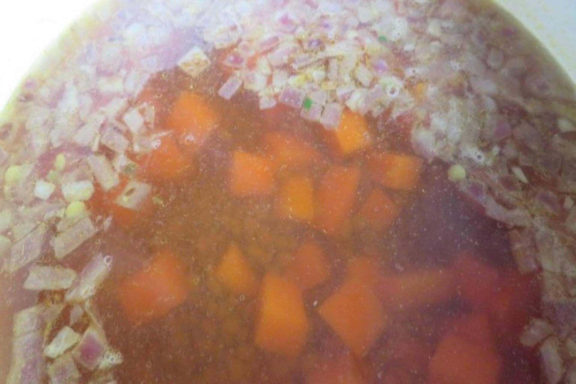 sweet potatoes added to the pan with stock