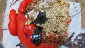 ingredients for the easy muhammara in a food processor