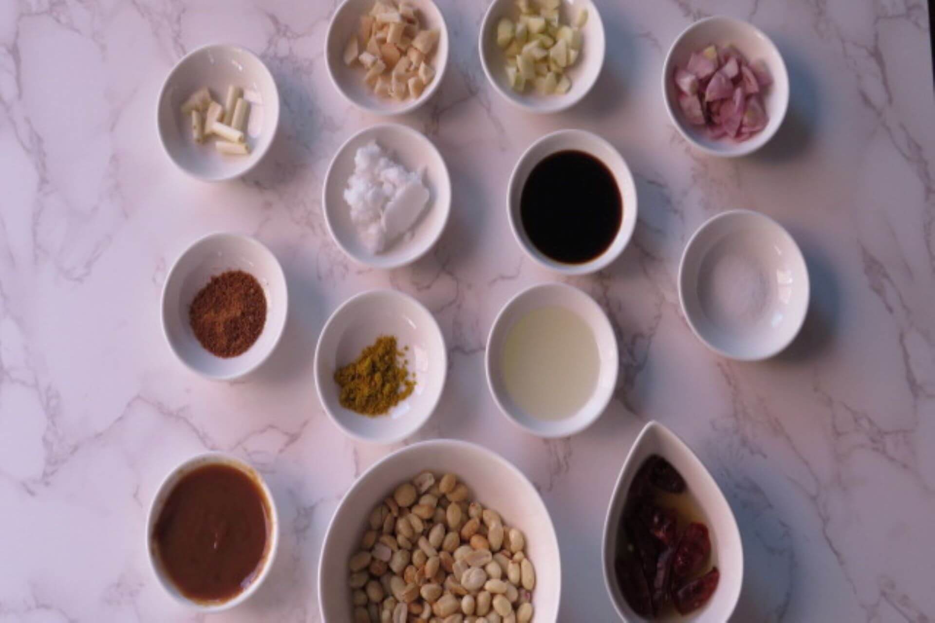 ingredients in bowls for satay sauce