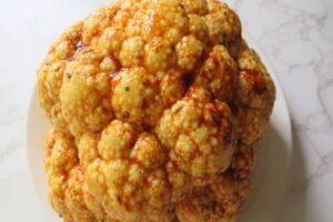 whole cauliflower with the marinade