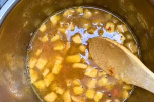 veggies with stock in the pot