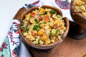 moroccan couscous salad in a wooden bowl