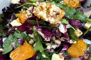 radicchio salad in a bowl with toasted hazelnuts