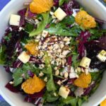 radicchio salad recipe with oranges in a white bowl