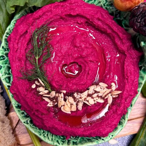 roasted beet hummus with watermelon seeds and dill