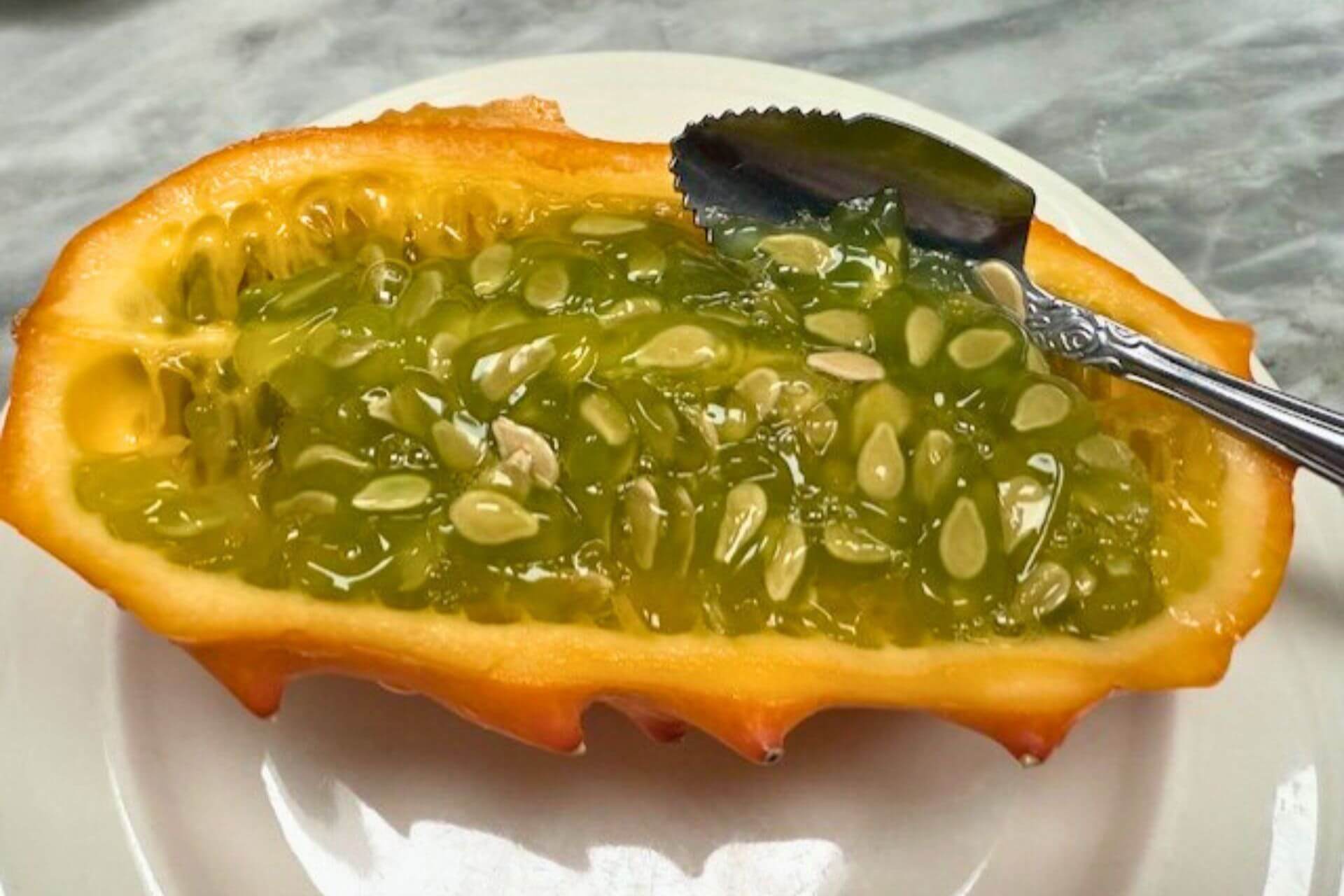 kiwano or horned melon with a spoon