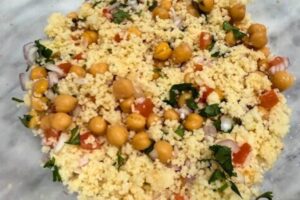 salad ingredients mixed in a bowl