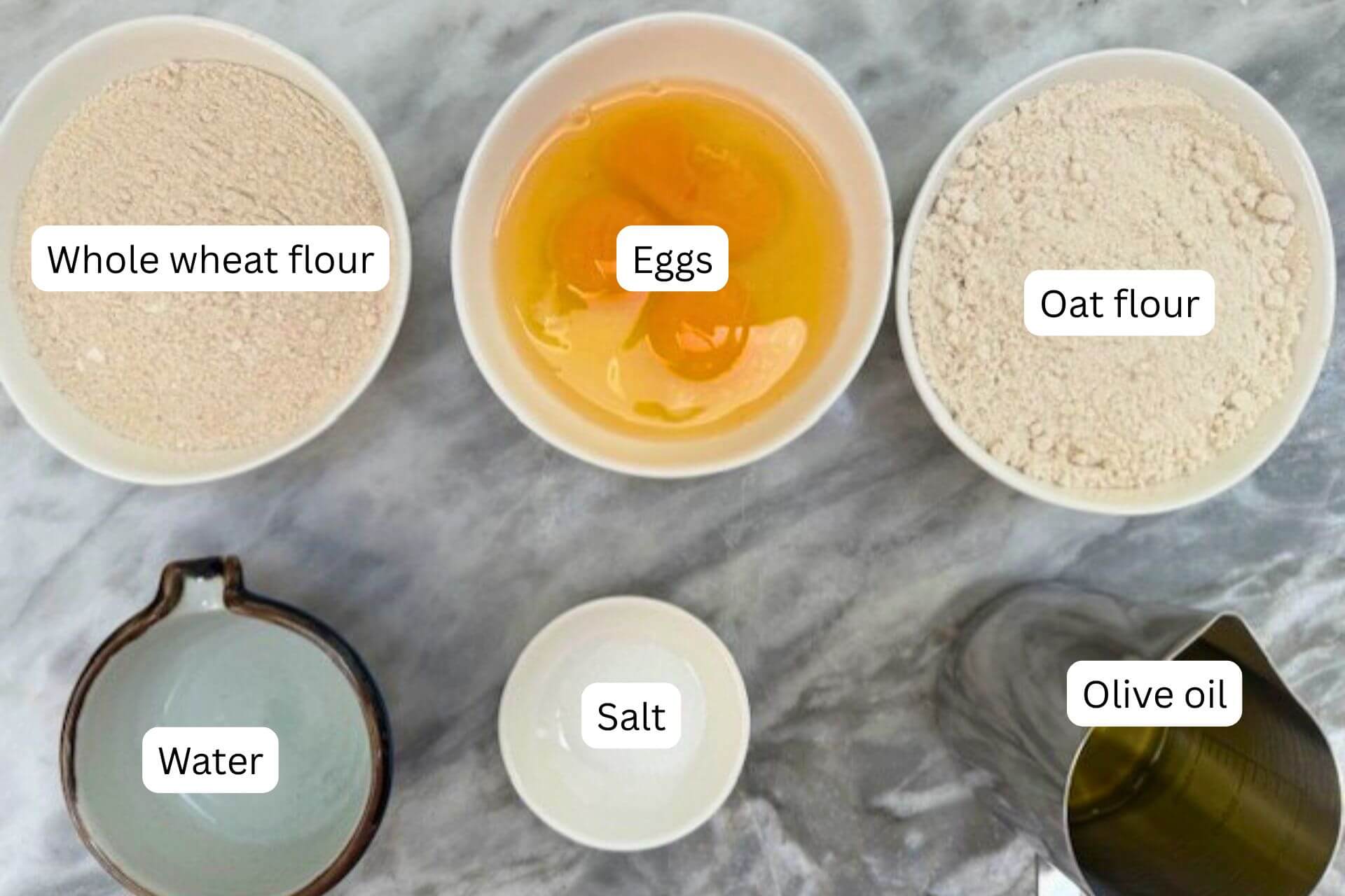 measured ingredients in bowls for the dough