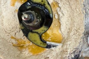 egg mixture added to the flour