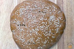 khobz recipe bread baked and topped with sesame seeds