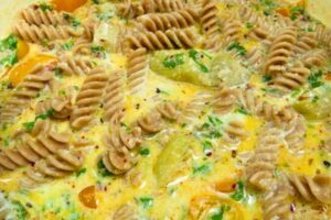 fusilli added to the sauce