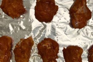 wings air-fried in a foil- lined baking tray