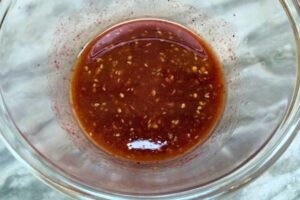 pomegranate vinaigrette with spices, lemon juice and salt