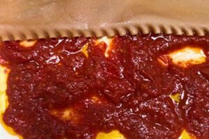marinara sauce layered with lasagna sheets