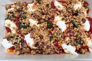 ricotta cheese and pesto with ground chicken filling layered