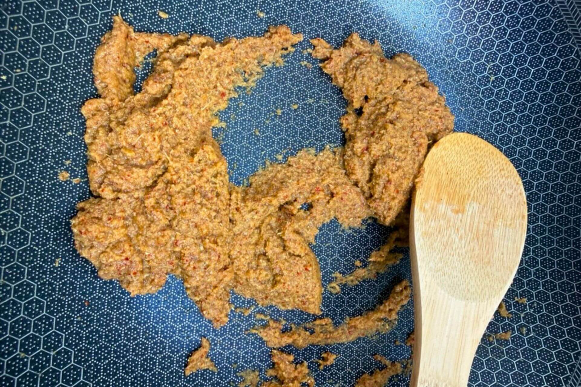 spice paste sauteed in a wok