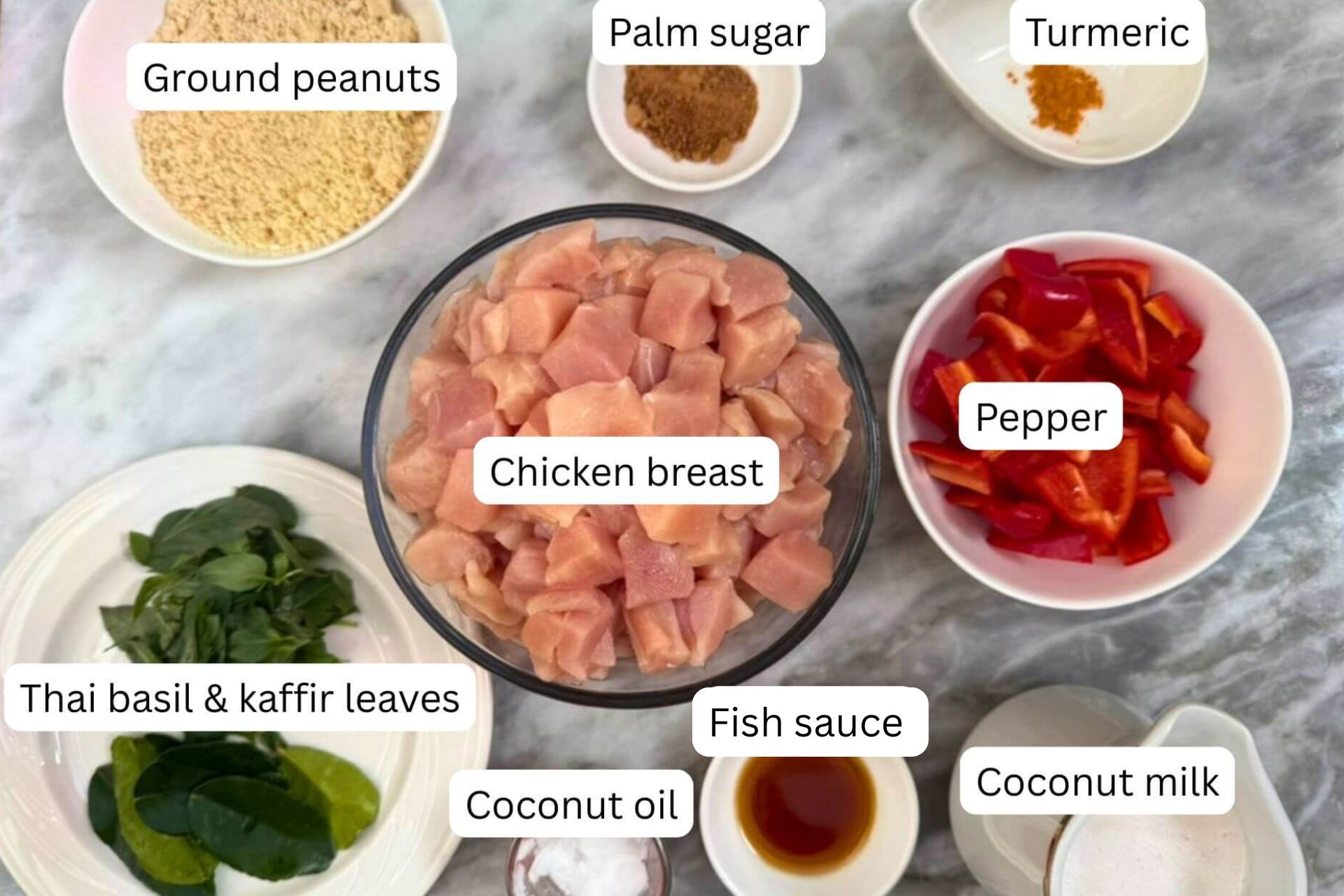 measured ingredients in bowls for the Panang chicken curry recipe
