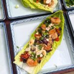 shrimp lettuce wraps in a blue tray