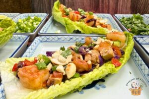 shrimp lettuce wraps in a blue plate