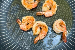 few shrimp pan fried with flour