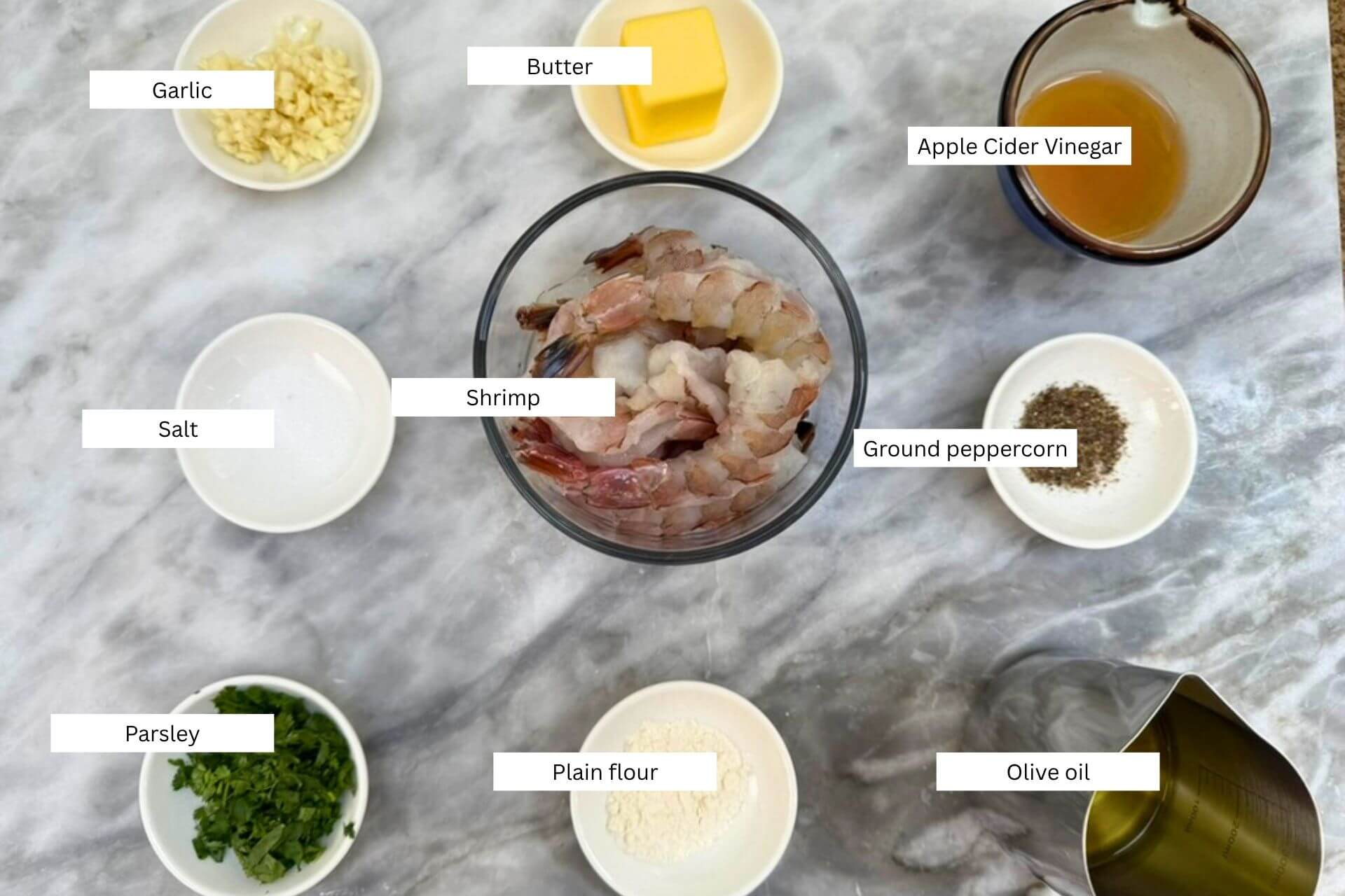 measured ingredients in bowls for easy garlic shrimp recipe
