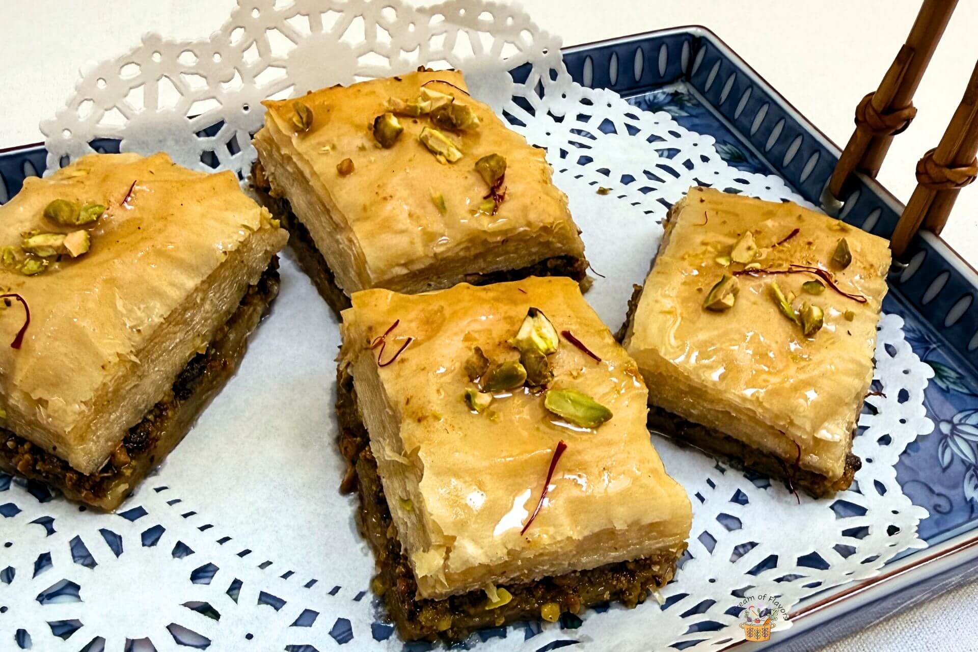 Lebanses baklawa garnished with pistachios and saffron