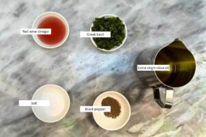 measured ingredient sin bowls for the horiatiki dressing
