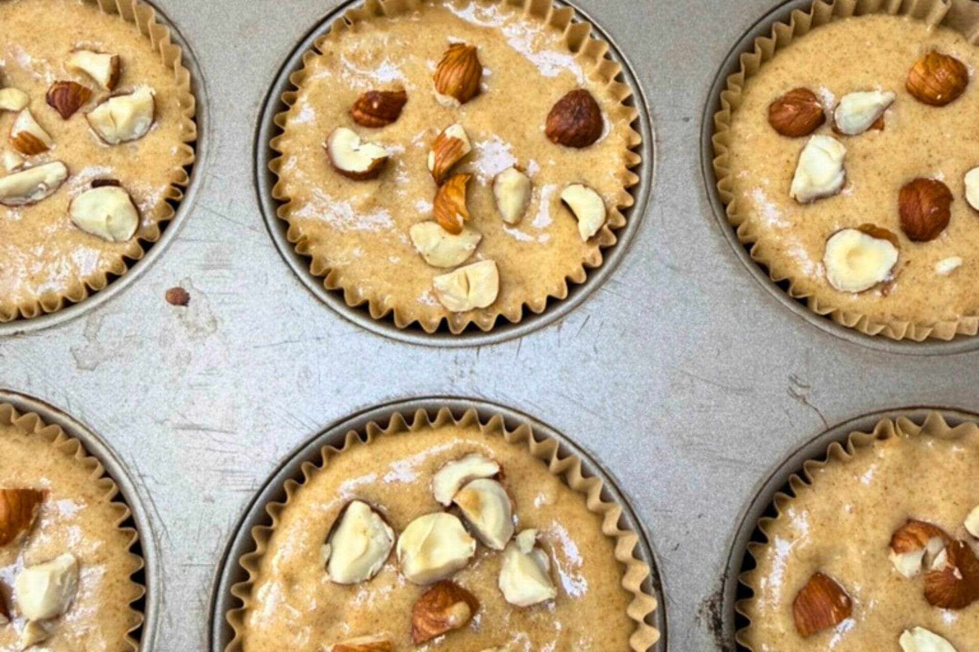 muffins in muffin tray to be baked