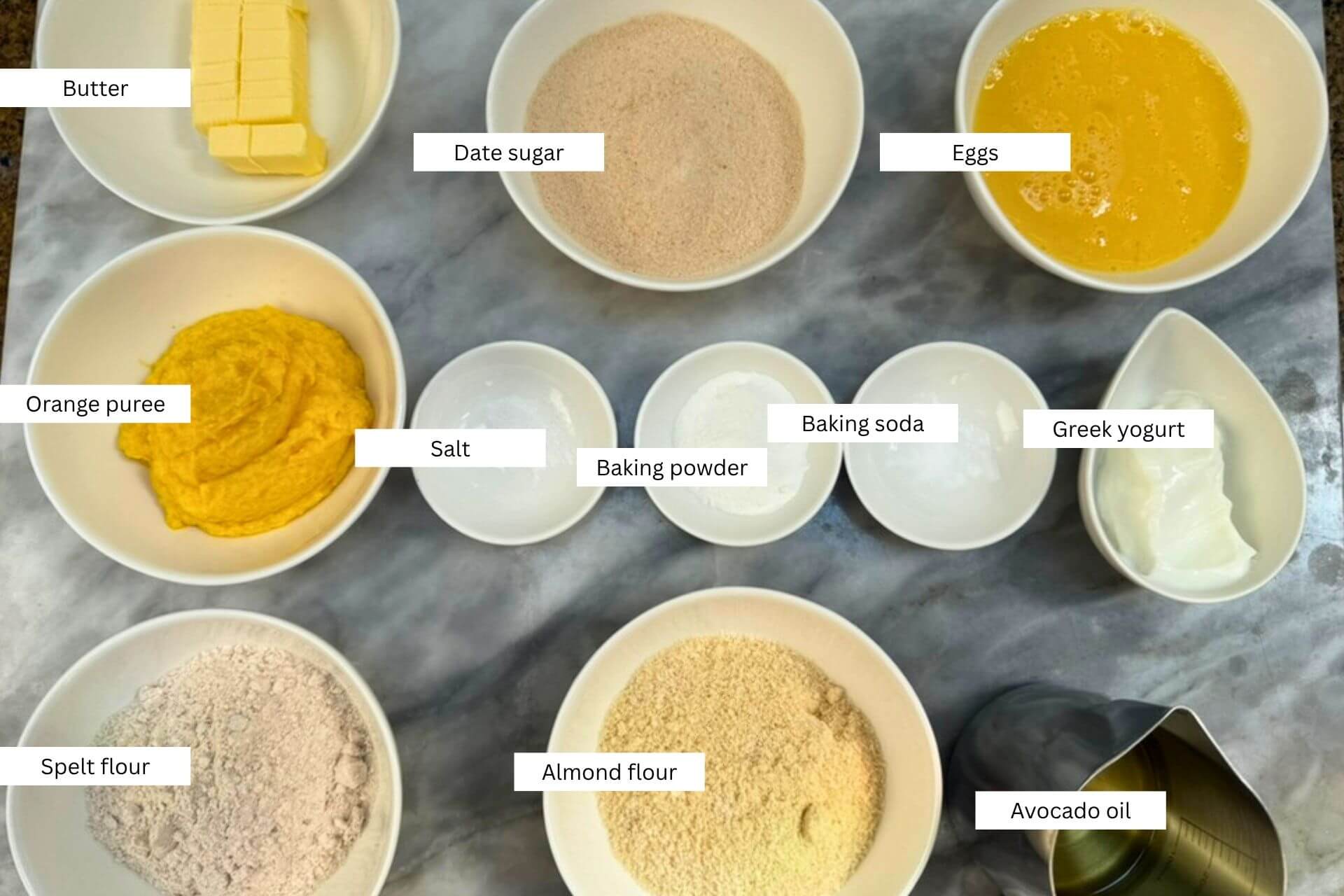measured ingredients in bowls for the whole orange cake sicilian style