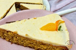 Sicilian whole orange cake slice decorated with ornage segment